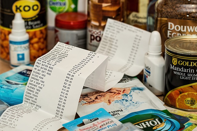 a long grocery receipt on top of a selection of grocery items